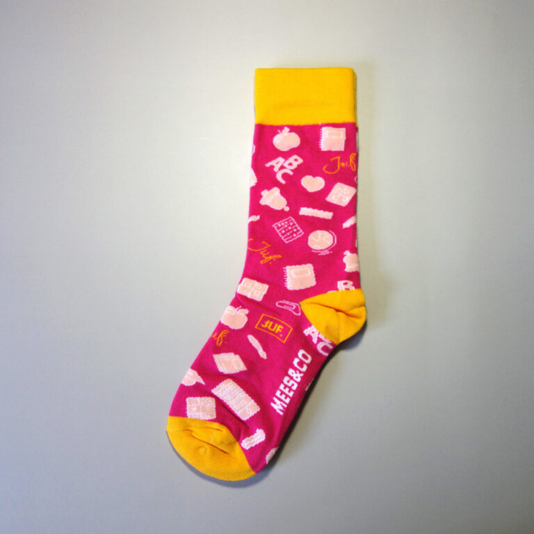 Custom Logo Socks with Brand name on sole. Many patterns like notebooks, apples, earths, rings, are knitted in the sock. Base color: Pink. Secondary colors: Yellow, white.